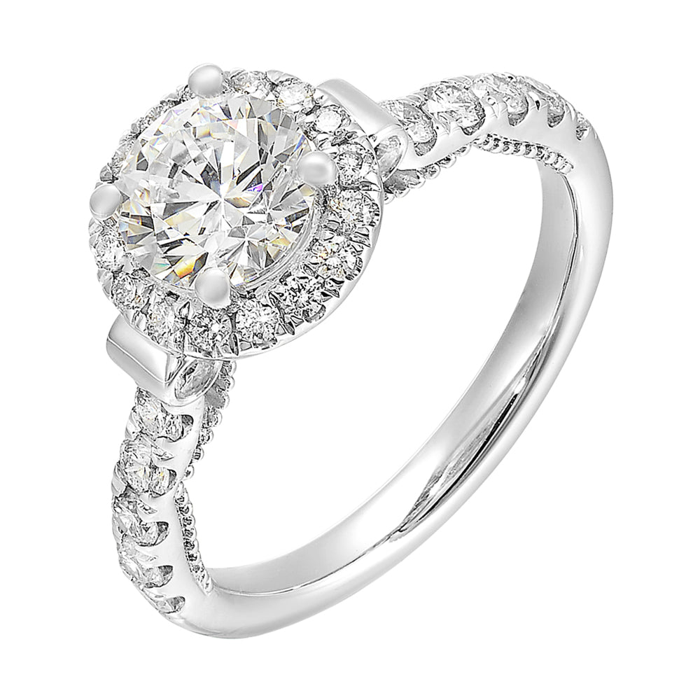 This rings beauty speaks for itself, solitaire halo with cathedral shank look and migraine details underneath are a true resemble of your love
