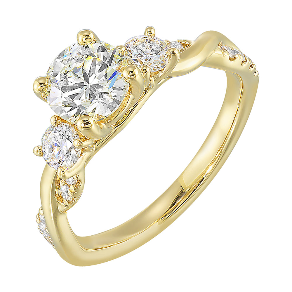 Gorgeous three stone ring features a round solitaire with one smaller diamond on either side. All of this sits a top a criss cross band with playful flow of diamond is a perfect choice.