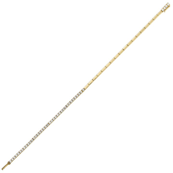 This exquisite yellow gold bracelet merges classic design with a touch of modernity. Seamlessly connecting polished links with a row of radiant diamonds, it shimmers with unmatched charm.