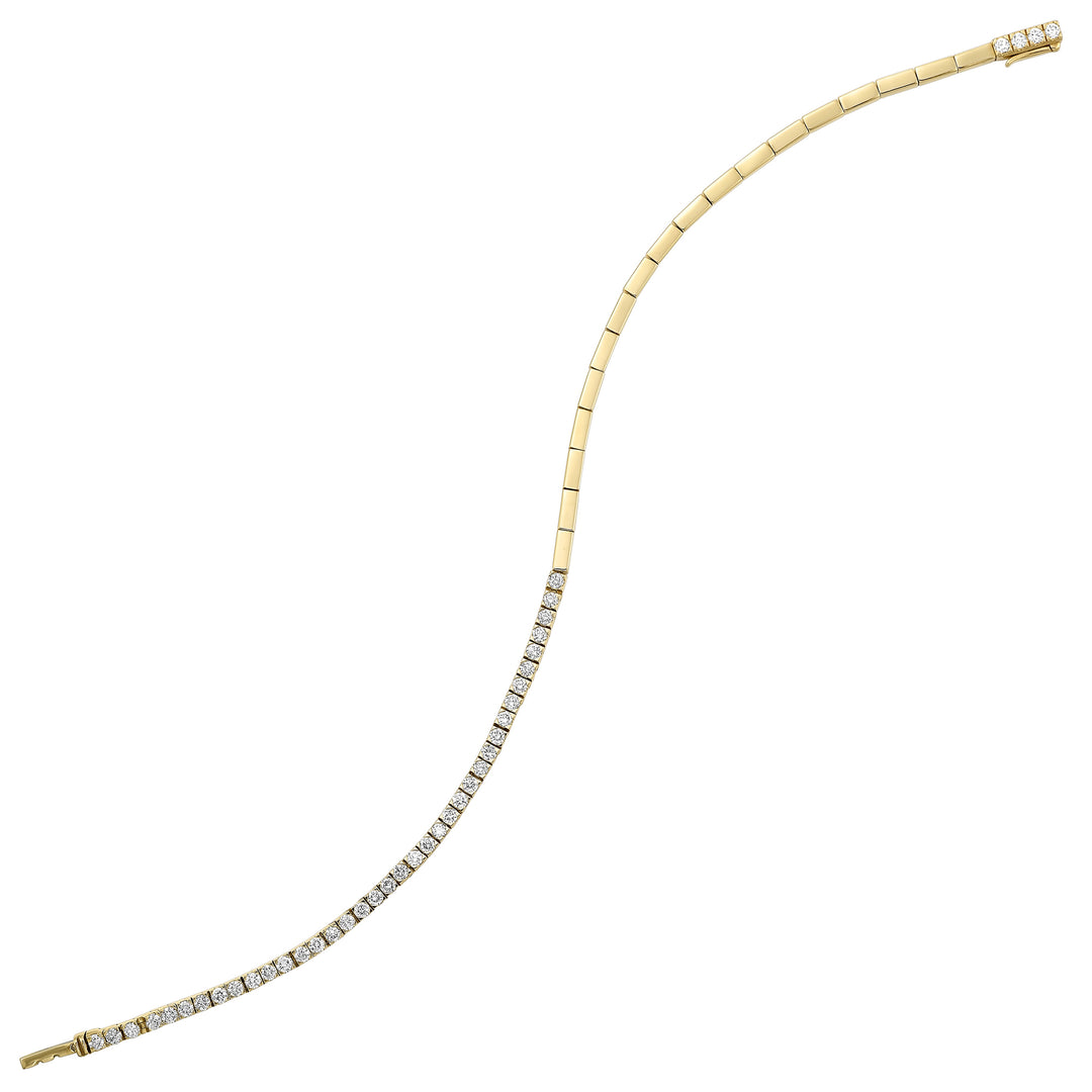 This exquisite yellow gold bracelet merges classic design with a touch of modernity. Seamlessly connecting polished links with a row of radiant diamonds, it shimmers with unmatched charm.