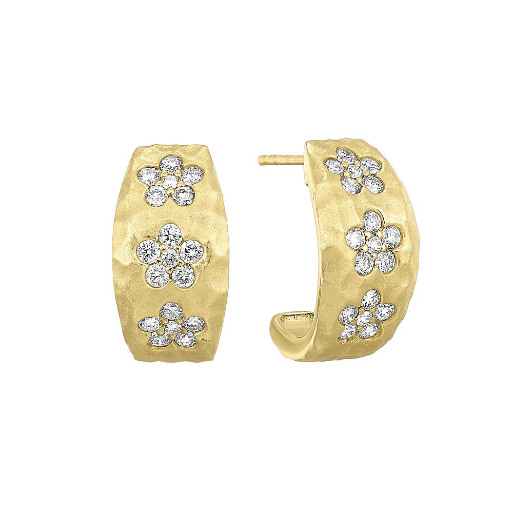 These captivating yellow gold earrings showcase floral designs made of brilliant diamonds set against gleaming gold. Accompanied by heart-shaped fastenings,  they embody natures elegance.