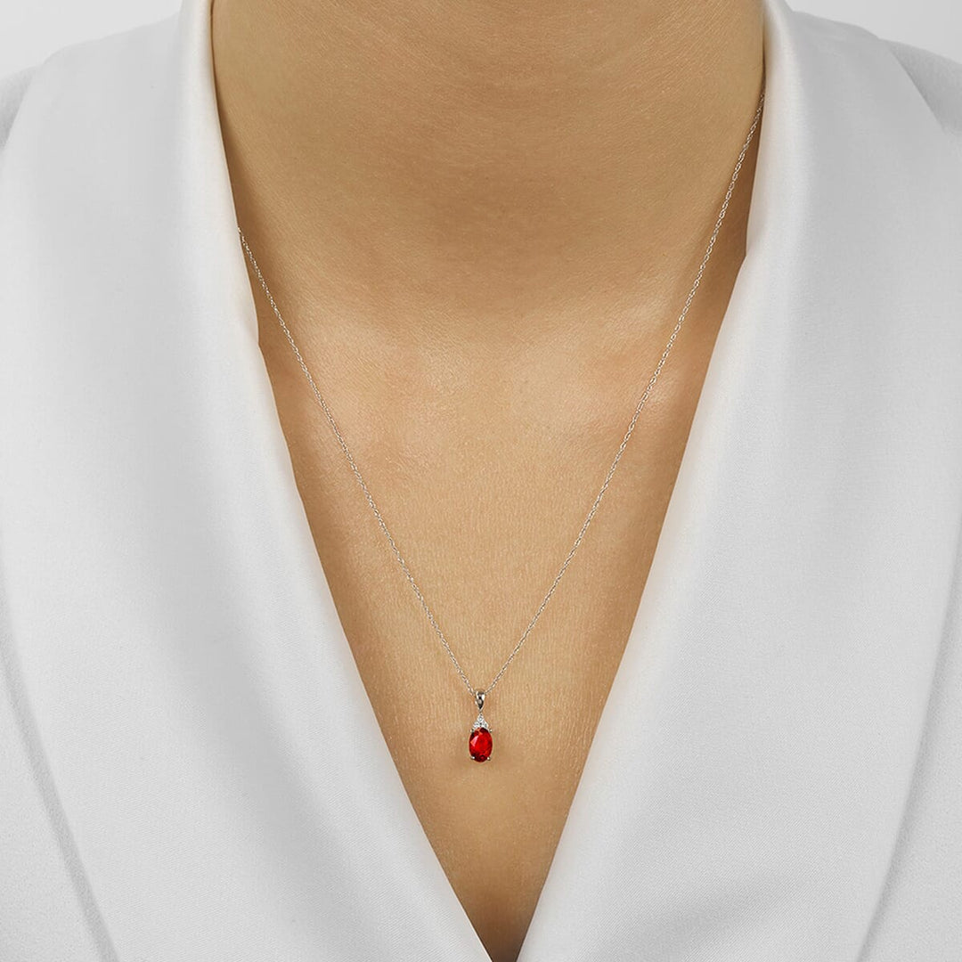 10Kt White Gold Diamond 1/50Ctw & Garnet 1/2Ctw Pendant