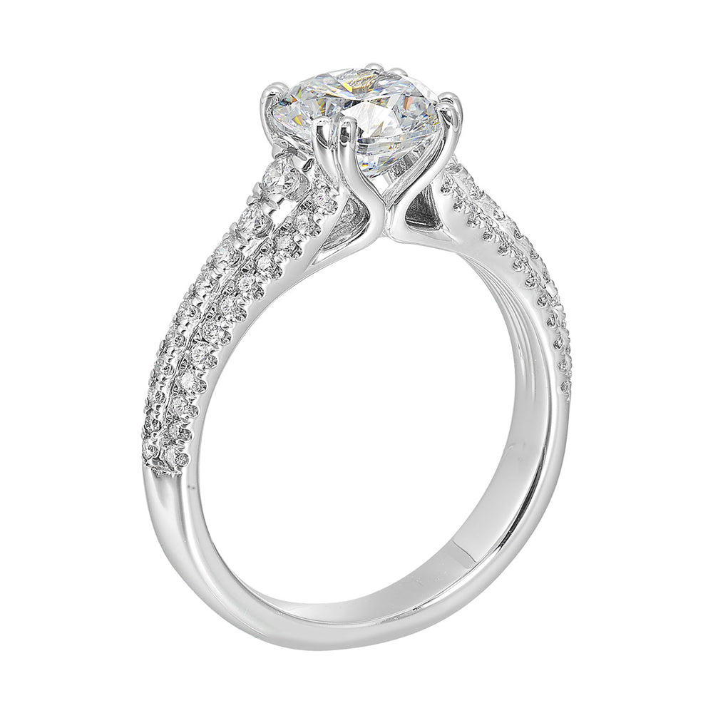Three rows of micro pave diamonds tappering at the bottom adorns the shank highlighting the center diamond beautifully.