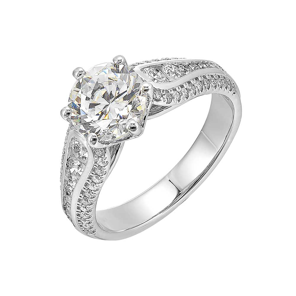Stunning solitaire ring set in 6 prongs is a dazzling display of channel set diamonds in the center & pave on sides making the ring more appealing.