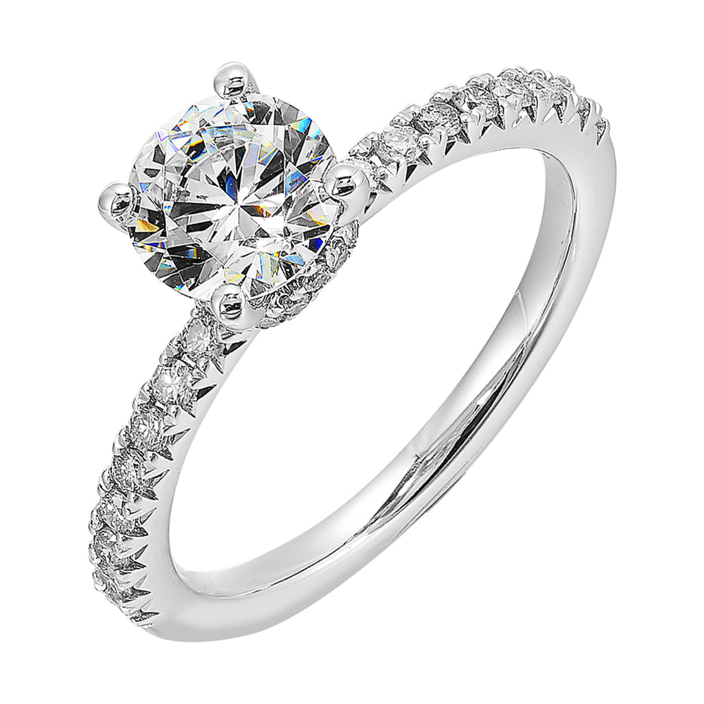 Round solitare meets sleek diamond pave offering timeless elegance.