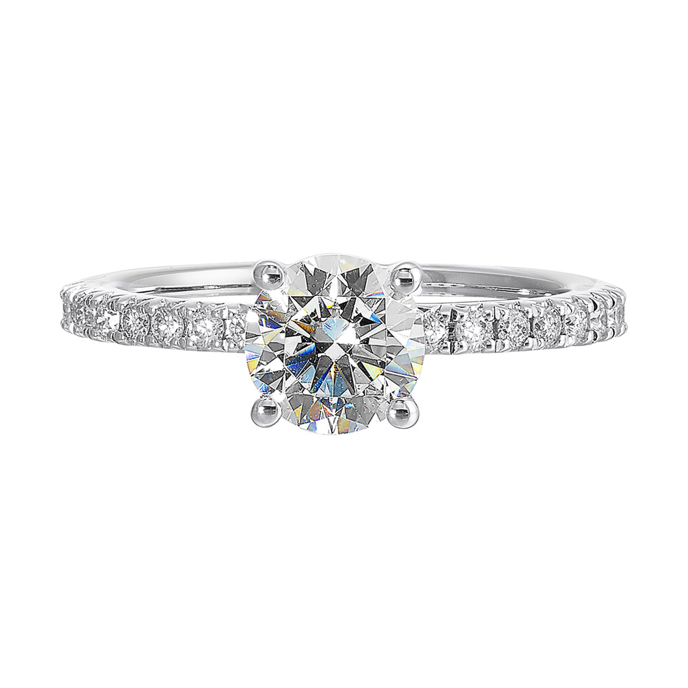 Round solitare meets sleek diamond pave offering timeless elegance.