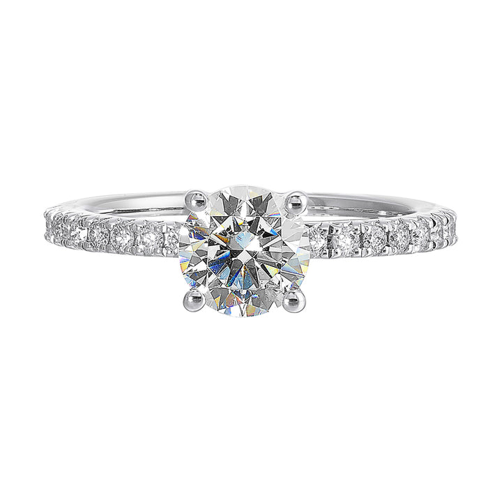 Round solitare meets sleek diamond pave offering timeless elegance.