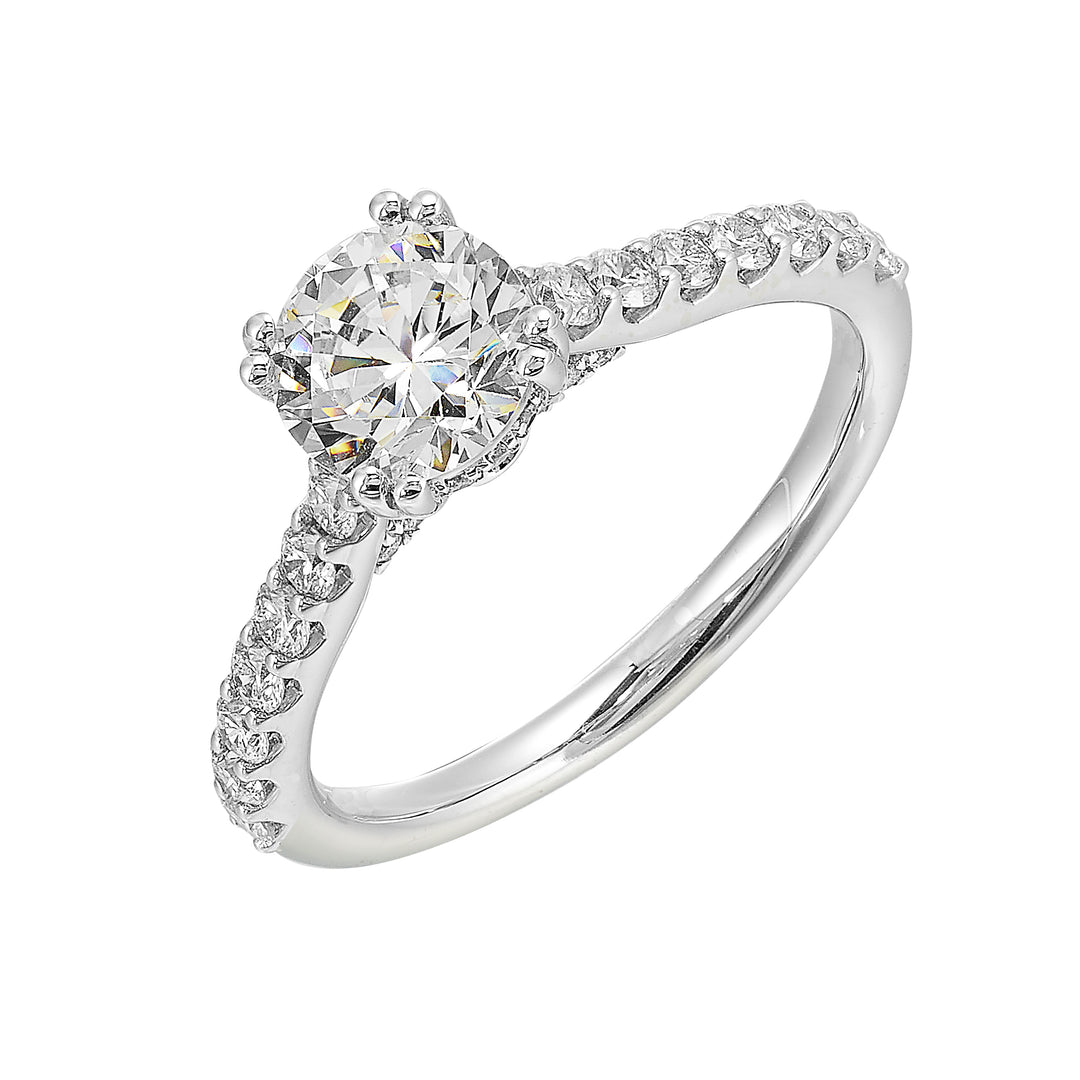 Celebrate a dazzling solitaire diamond set in dual prong on a sleek diamond shank making it a cherished symbol of your love.