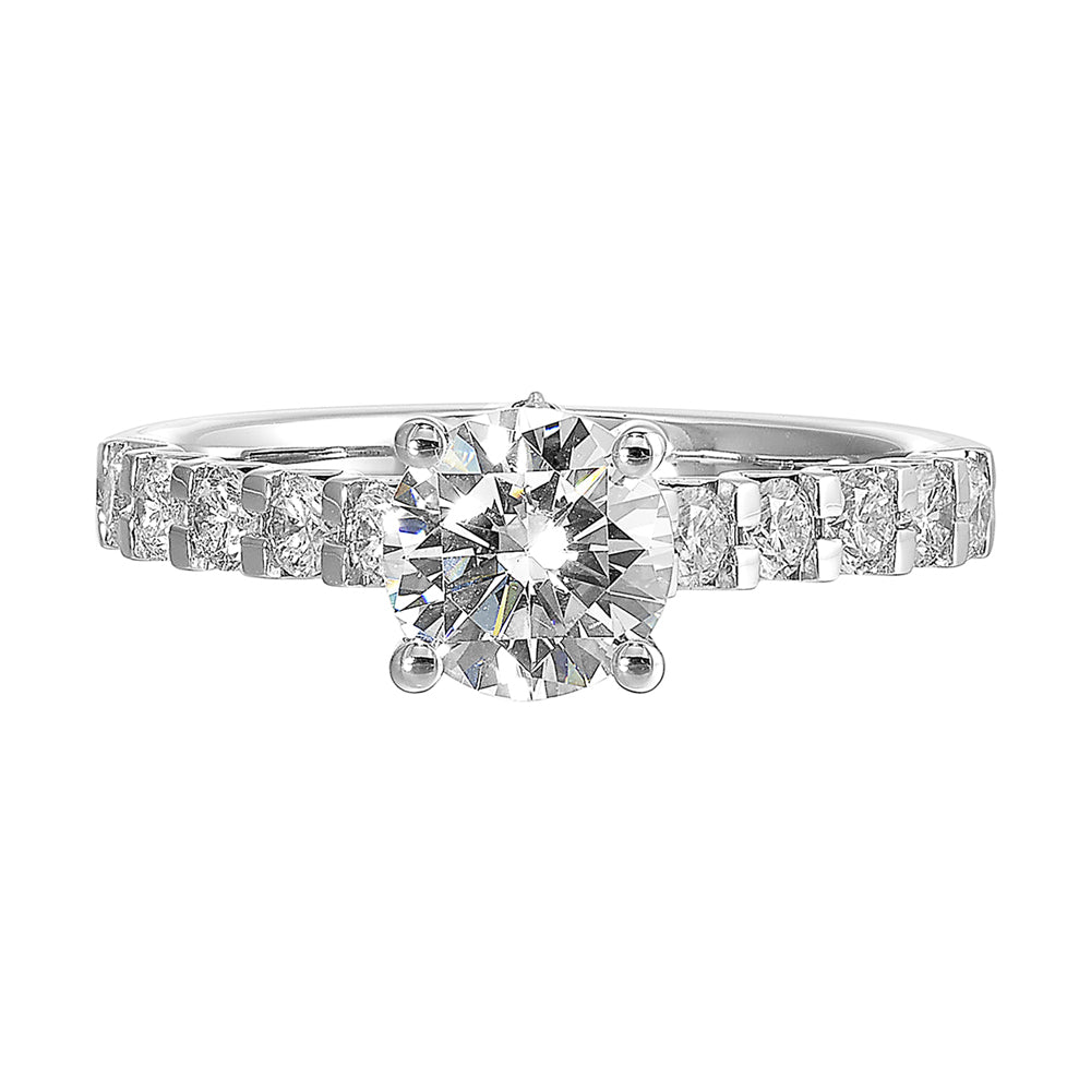 A solitaire takes center stage on a band elevated by diamonds set with common prongs along the shank is a timeless beauty.