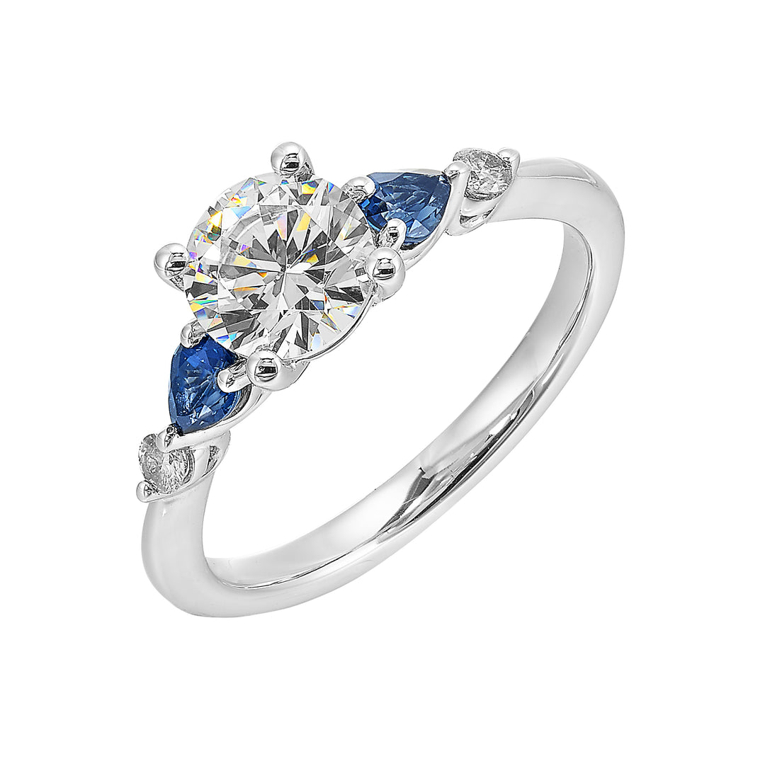Colourful celebration! This five stone ring features round solitaire diamonds followed by pear shape colorstone and a round diamond at the end,  offers a touch of color to your personality.