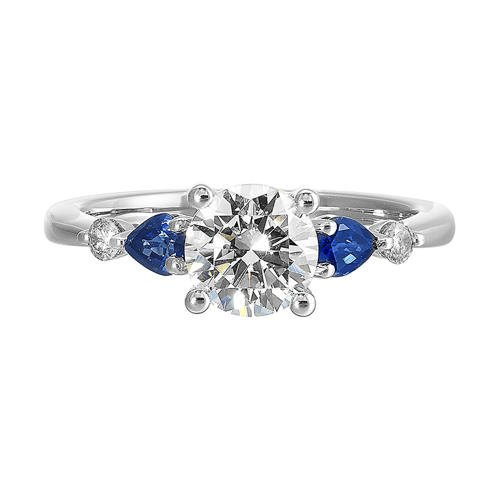 Colourful celebration! This five stone ring features round solitaire diamonds followed by pear shape colorstone and a round diamond at the end, offers a touch of color to your personality.