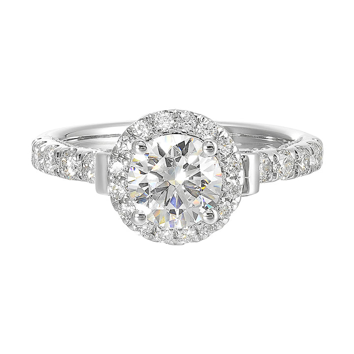 This rings beauty speaks for itself, solitaire halo with cathedral shank look and migraine details underneath are a true resemble of your love