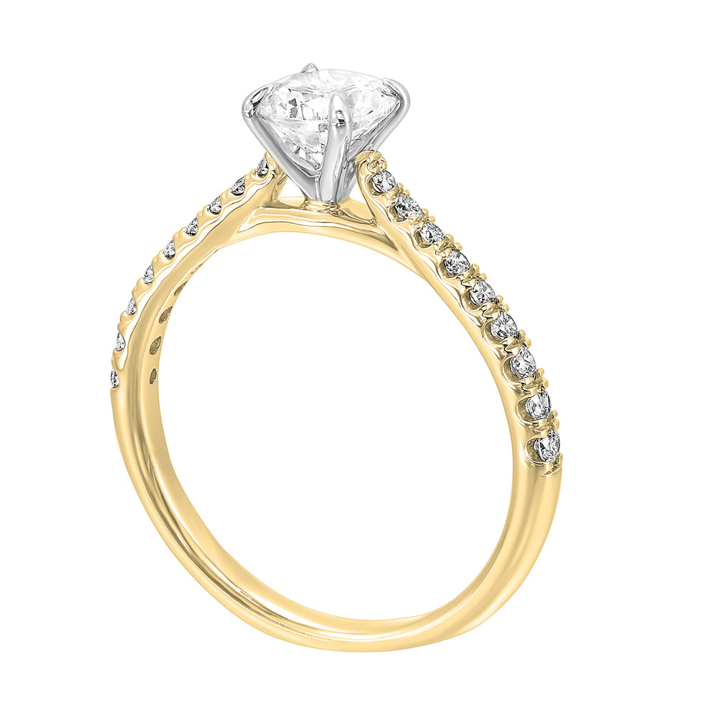 A vibrant micro pave set diamond provides an endless sparkle with the center focused look.