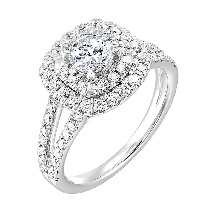 Elevated center surrounded by two sparkling cushion halos and split shank will mark your commitment to a lifelong promise
