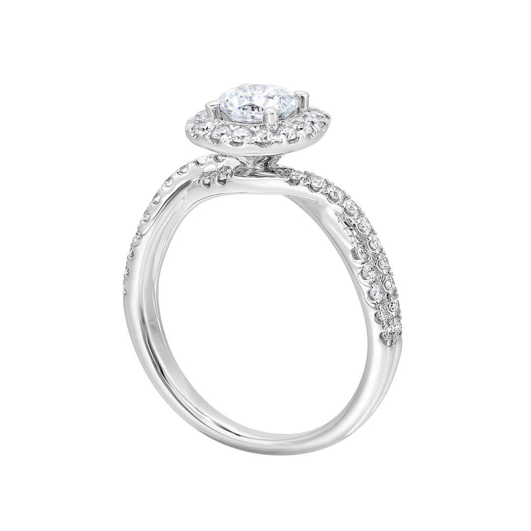 Pave diamonds embellish the loose twisted band. To top it off, diamonds in softer cushion halo  surround this mesmerizing diamond center.