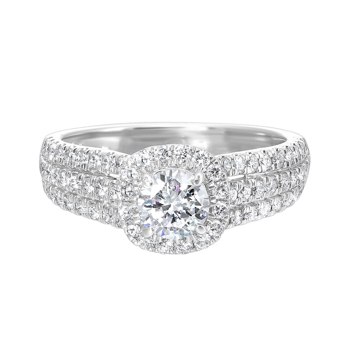 Tell your unique love story with this beautiful cushion halo engagement ring. Ring shank is split into three rows of diamonds, making this halo engagement ring sparkle even brighter.