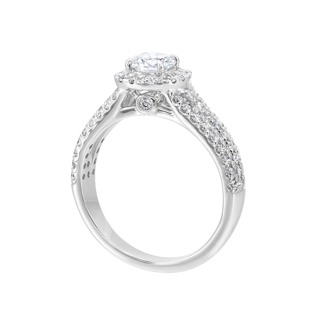 Tell your unique love story with this beautiful cushion halo engagement ring. Ring shank is split into three rows of diamonds, making this halo engagement ring sparkle even brighter.