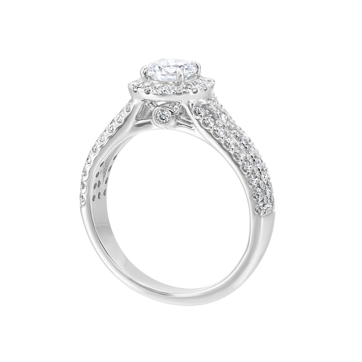Tell your unique love story with this beautiful cushion halo engagement ring. Ring shank is split into three rows of diamonds, making this halo engagement ring sparkle even brighter.