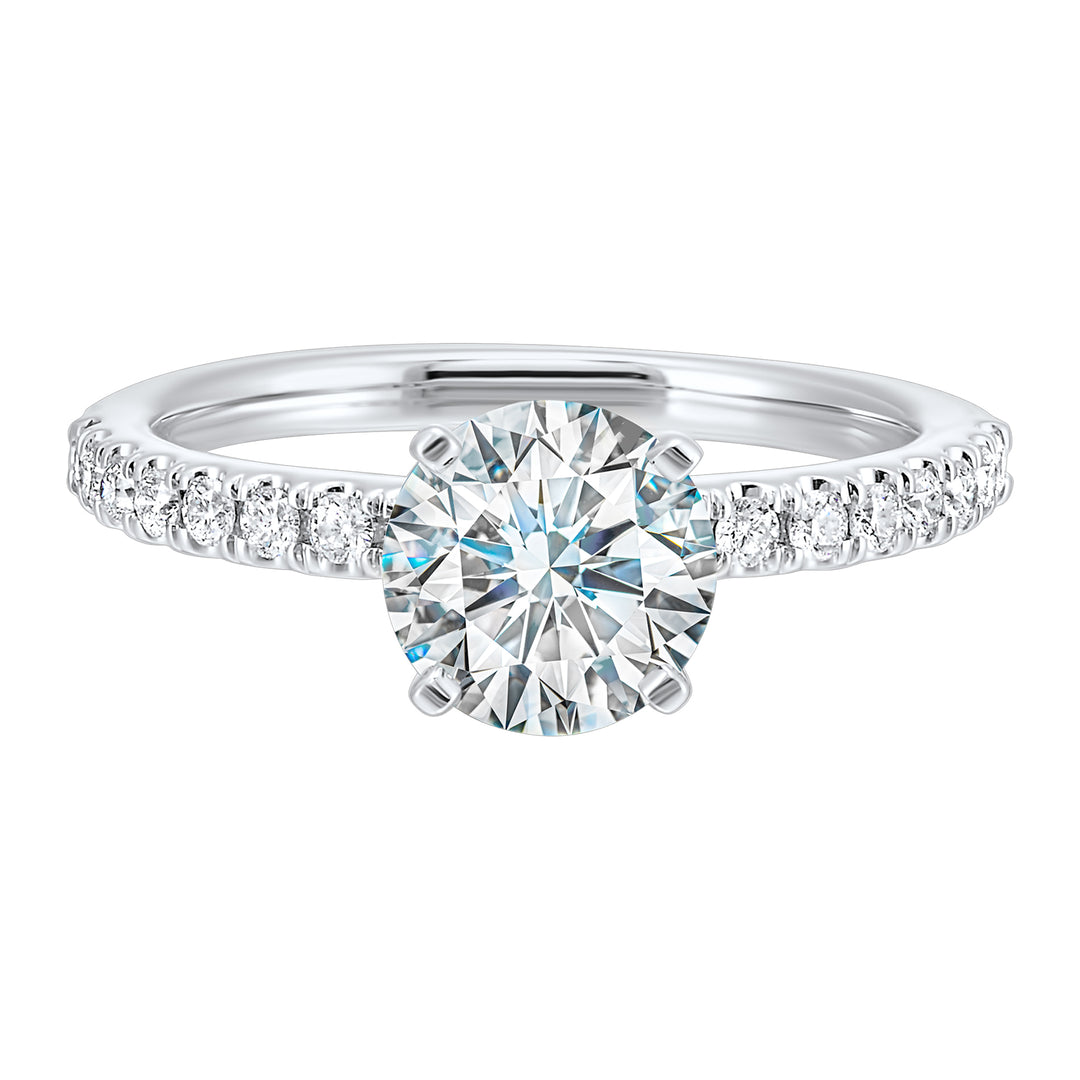 Classic and ready to make you shine, this ring features diamonds set in pave with a center solitaire.