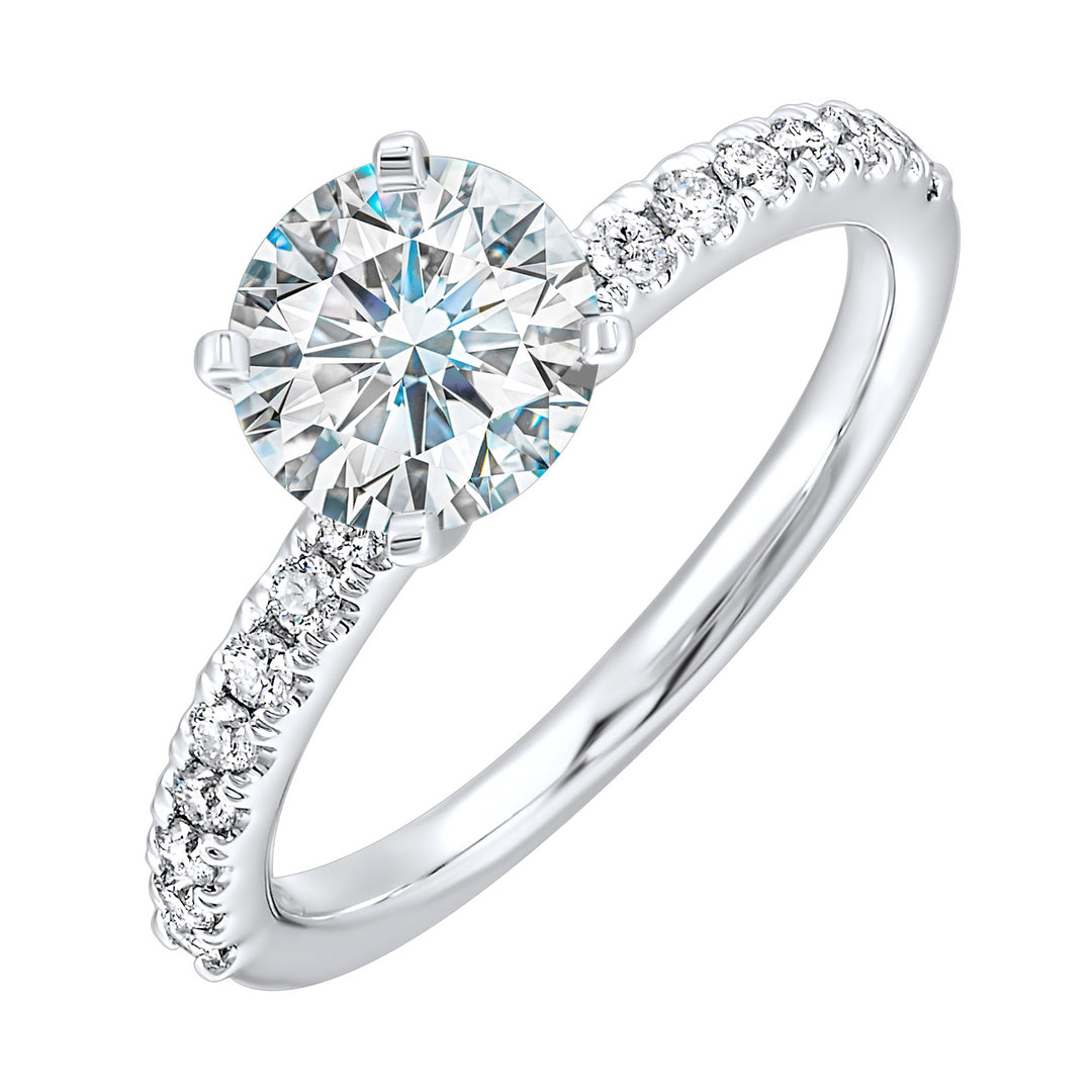 Classic and ready to make you shine,  this ring features diamonds set in pave with a center solitaire.