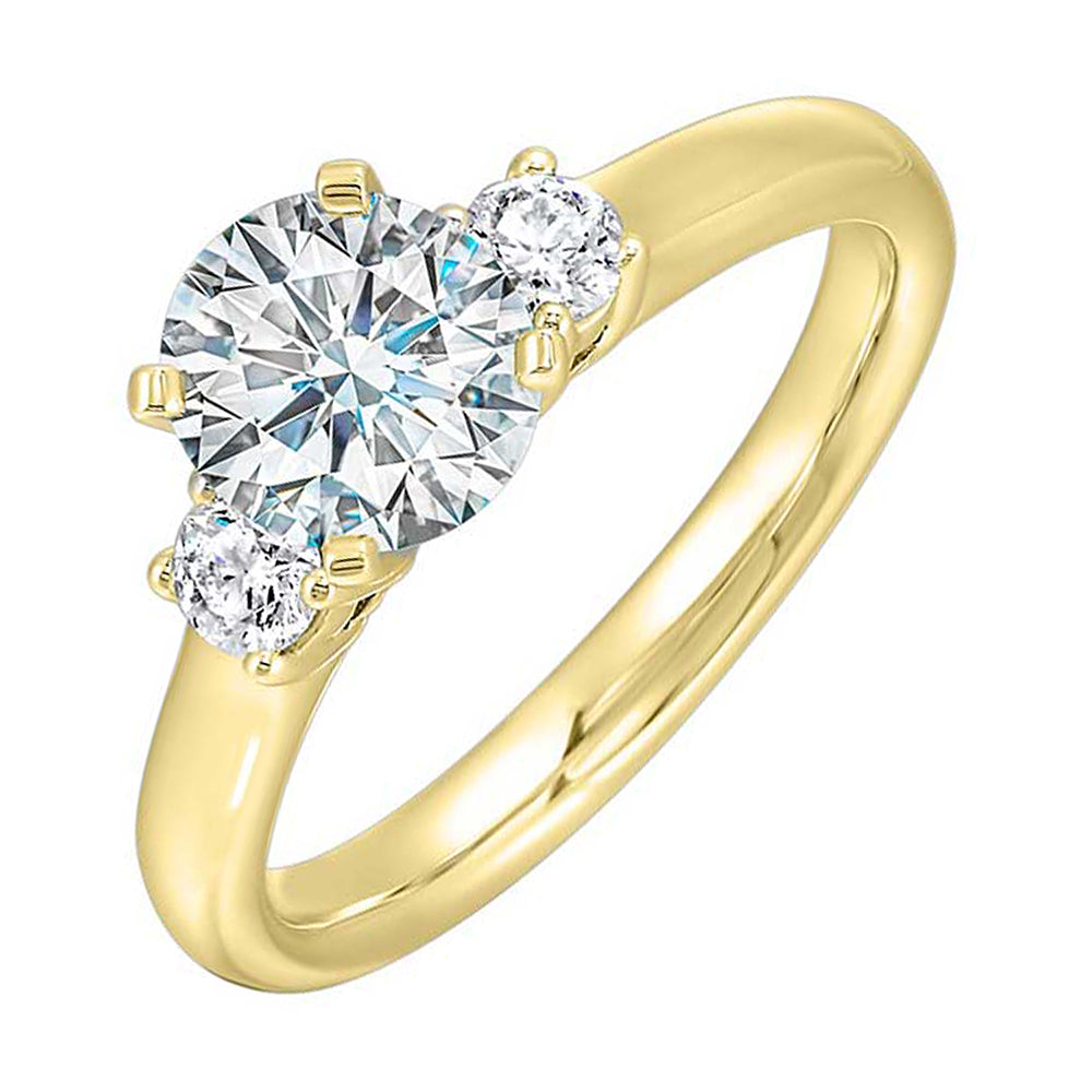 Classic and romantic,  this three stone engagement ring features the bold gold shank to sparkle your moments further.