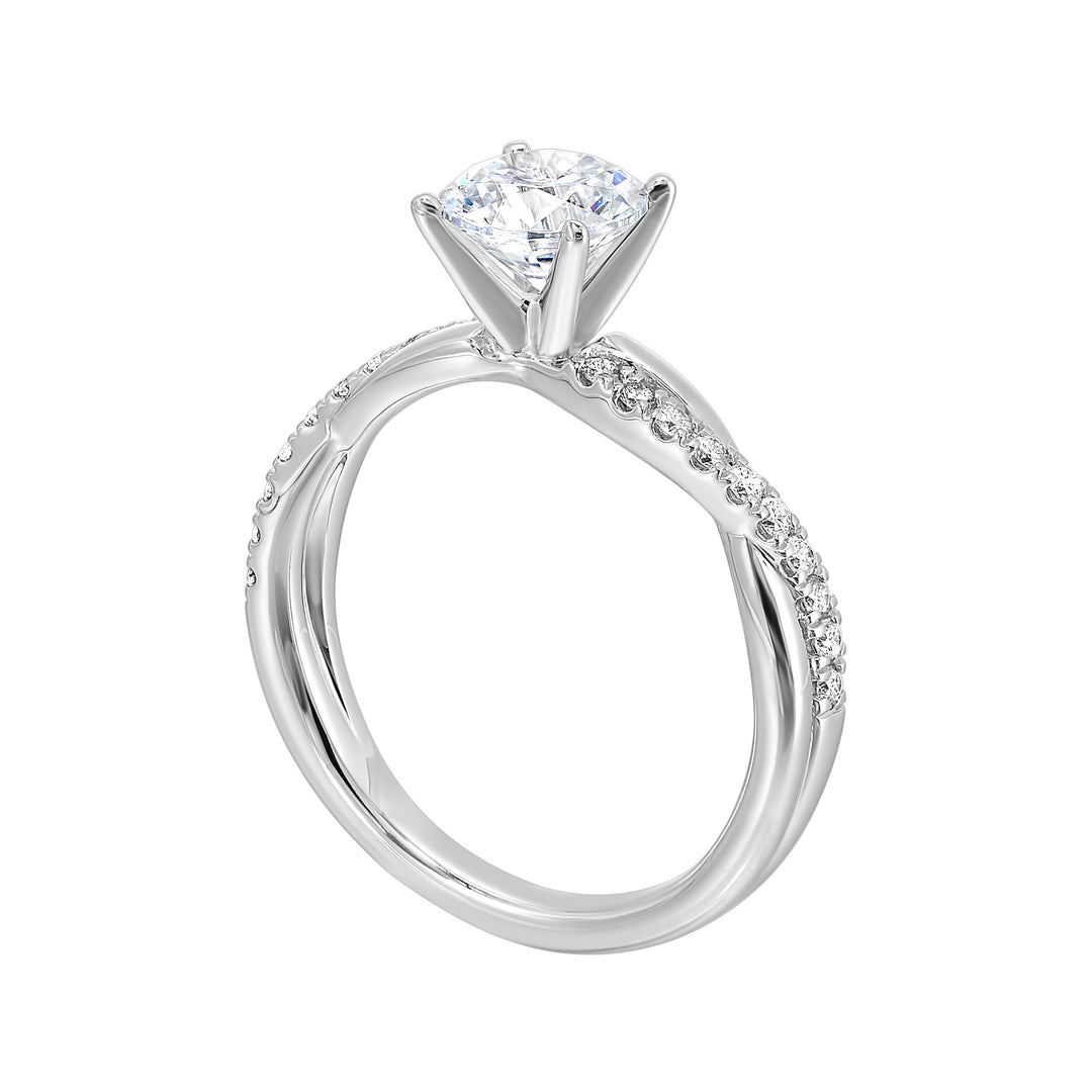 A stunning solitaire, embraced by a criss cross shank adorned with alternating flow of dazzling diamonds is sure to captivate her look.