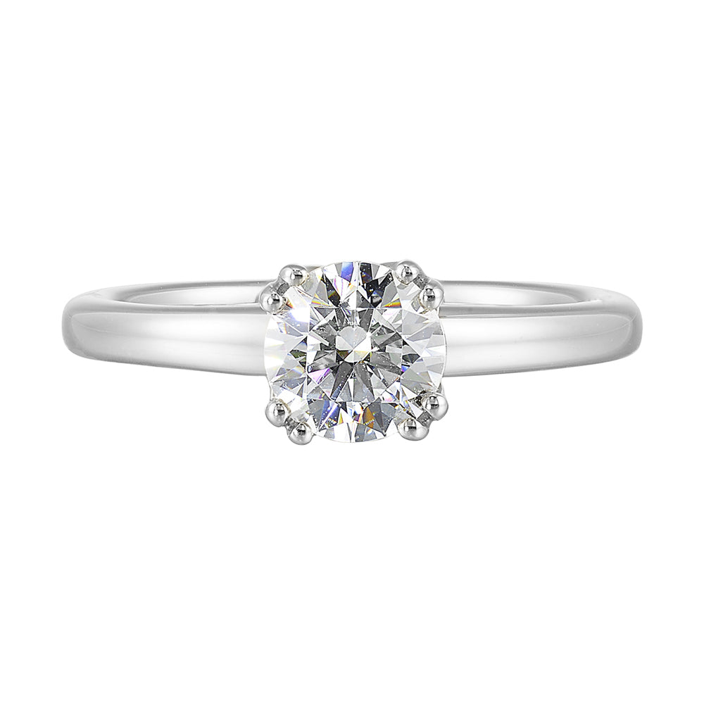 Chic and unique, this double prong setting solitare adds to the sleek, classic look to her style.