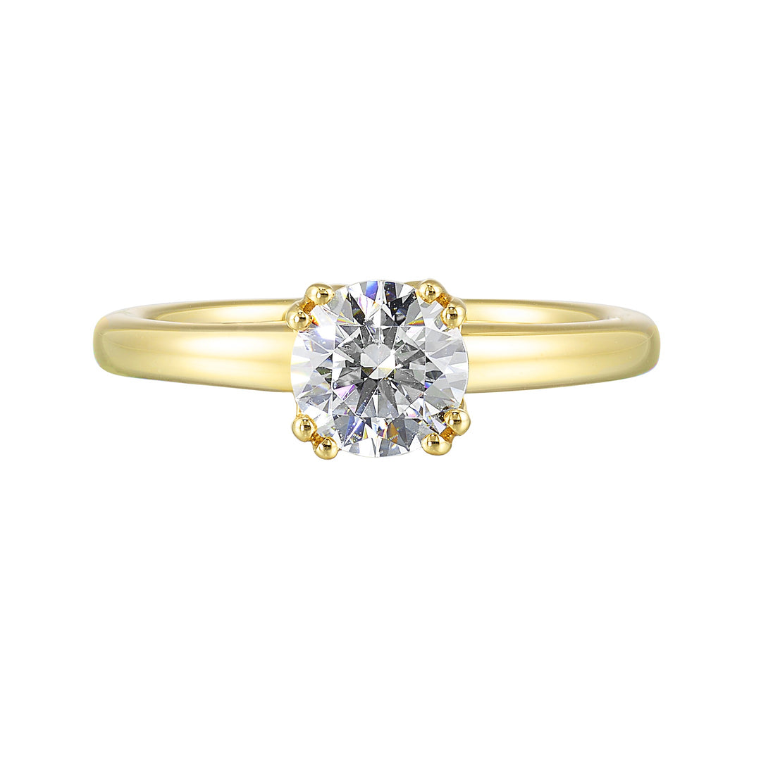 Chic and unique,  this double prong setting solitare adds to the sleek,  classic look to her style.