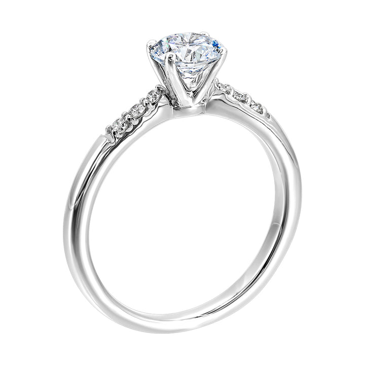 Complement your center diamond perfectly with accented pave-set diamonds along the shoulders of the shank.