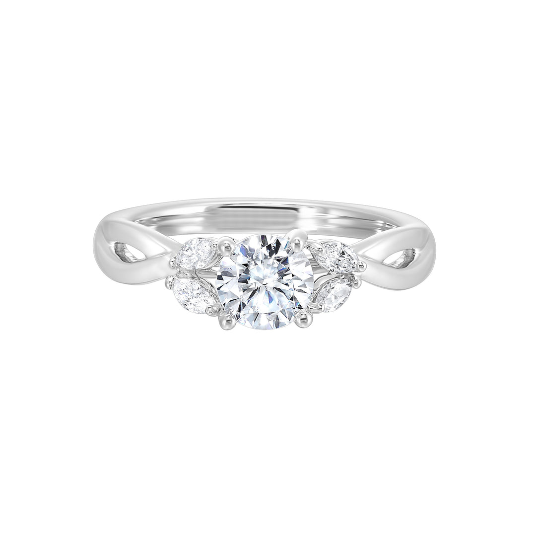 Gorgeous three stone twist engagement ring with added marquise on the shoulders highlights the center further.