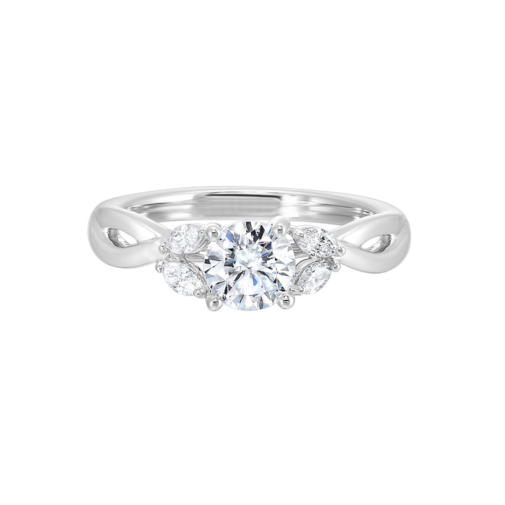 Gorgeous three stone twist engagement ring with added marquise on the shoulders highlights the center further.
