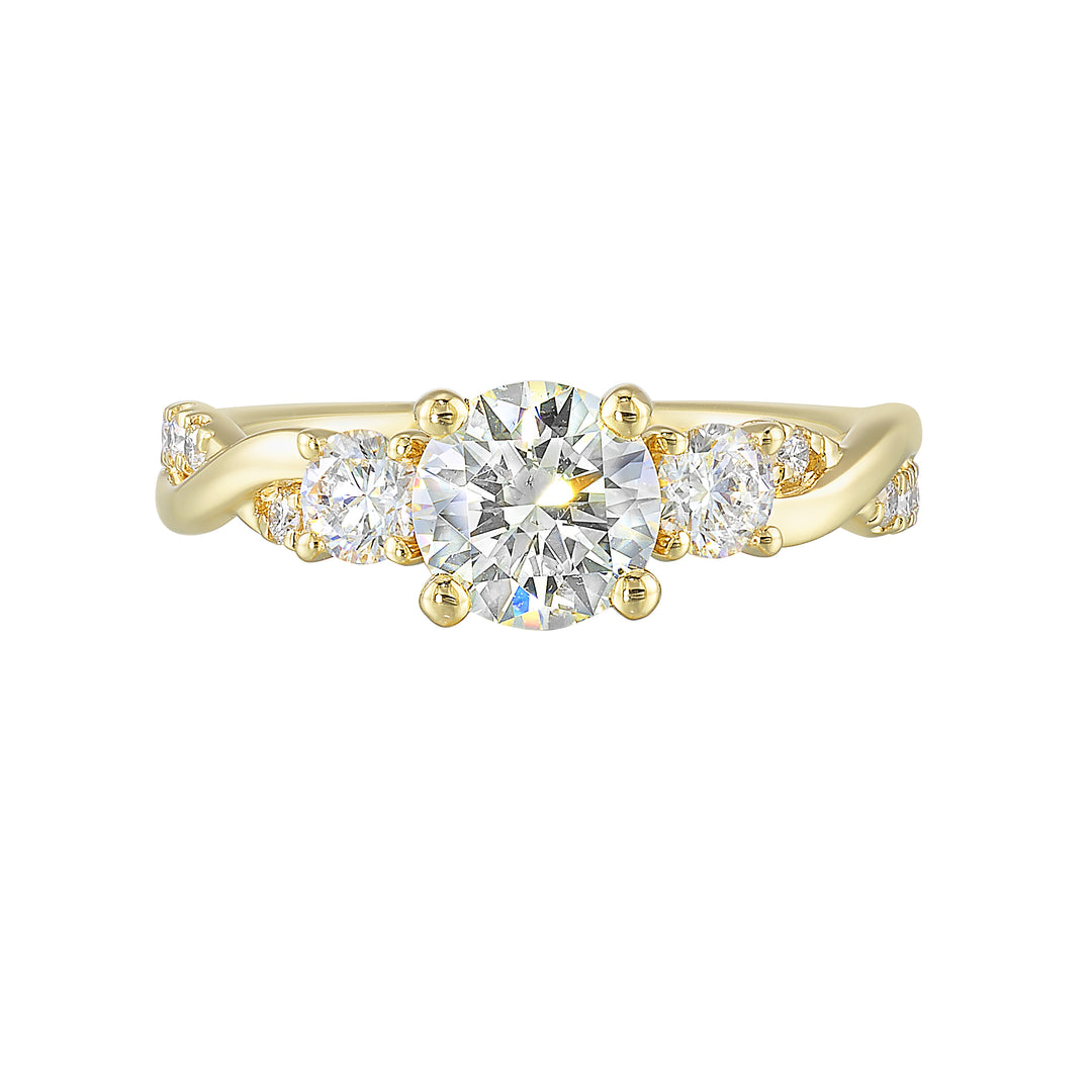 Gorgeous three stone ring features a round solitaire with one smaller diamond on either side. All of this sits a top a criss cross band with playful flow of diamond is a perfect choice.