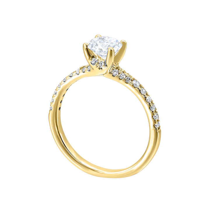 A showcase of sleek tapered pave diamonds enshrines this engagement ring with bigger solitare center.