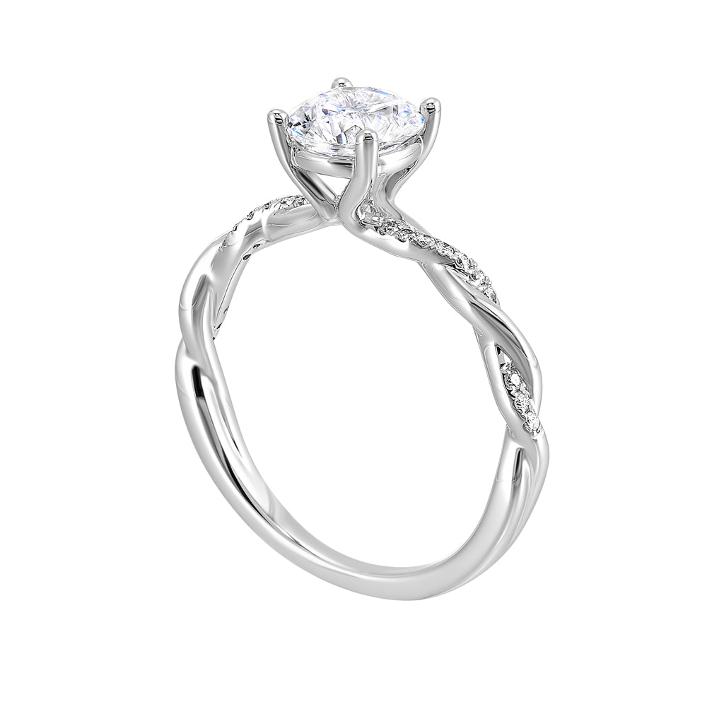 Three stone ring with a cluster of diamonds along the shoulder followed by a tapered diamond shank is sure to complement her.