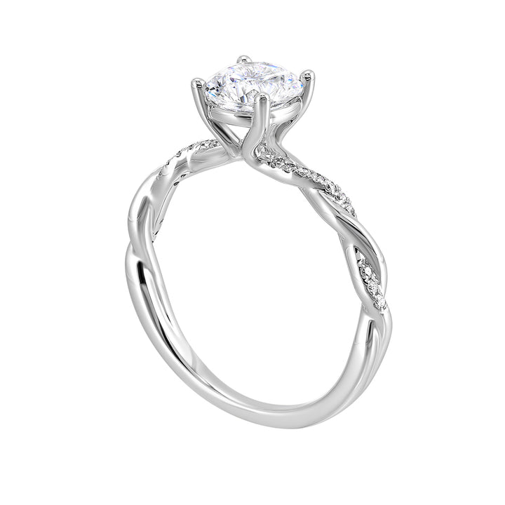 Three stone ring with a cluster of diamonds along the shoulder followed by a tapered diamond shank is sure to complement her.