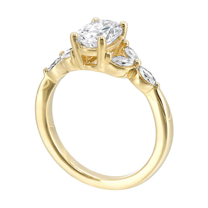 Elongated oval diamond takes center stage, framed by graceful trinity of marquise diamonds set on either side followed by a pinch shank is sure to flatten her.