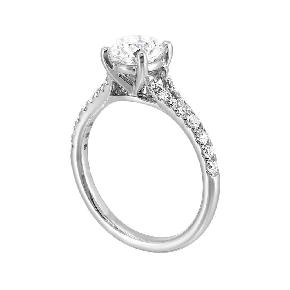 Double the sparkle with pave split shank engagement ring featuring solitare diamond center.
