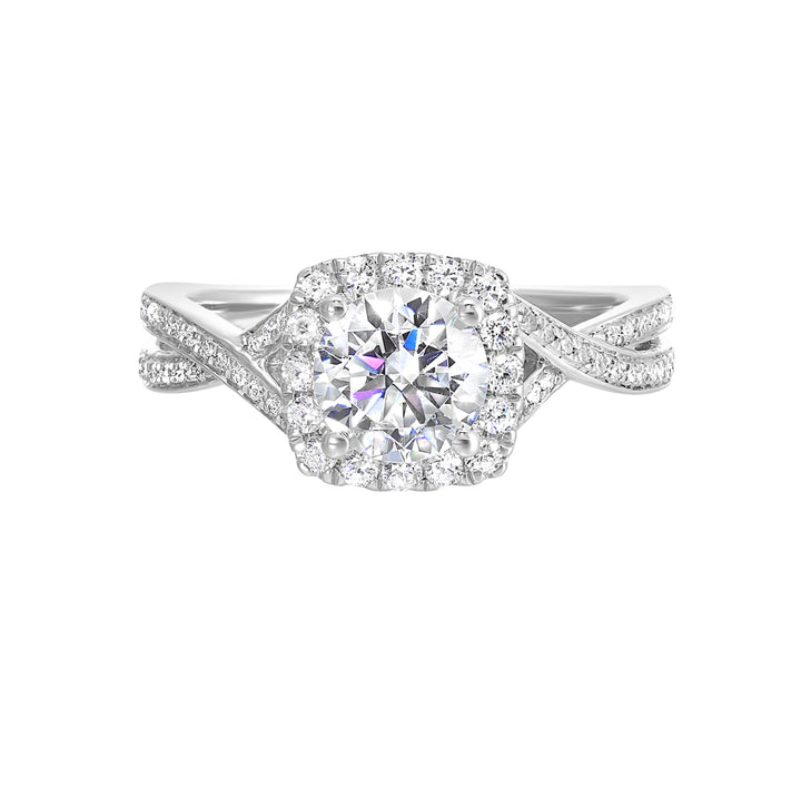Modern classic solitaire featuring a cushion halo around the solitare and entwined diamonds studded in shank is a perfect choice.