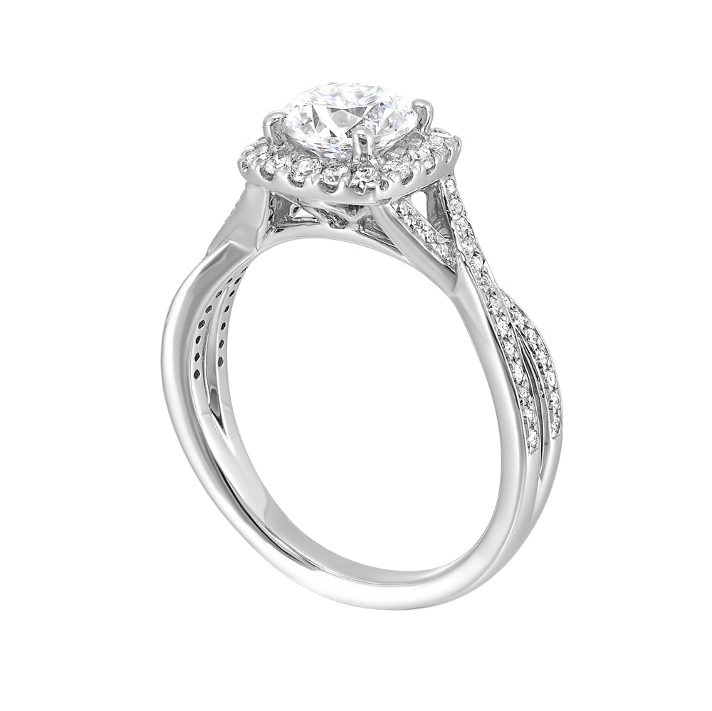 Modern classic solitaire featuring a cushion halo around the solitare and entwined diamonds studded in shank is a perfect choice.
