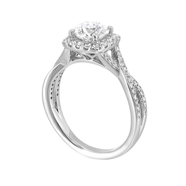 Modern classic solitaire featuring a cushion halo around the solitare and entwined diamonds studded in shank is a perfect choice.