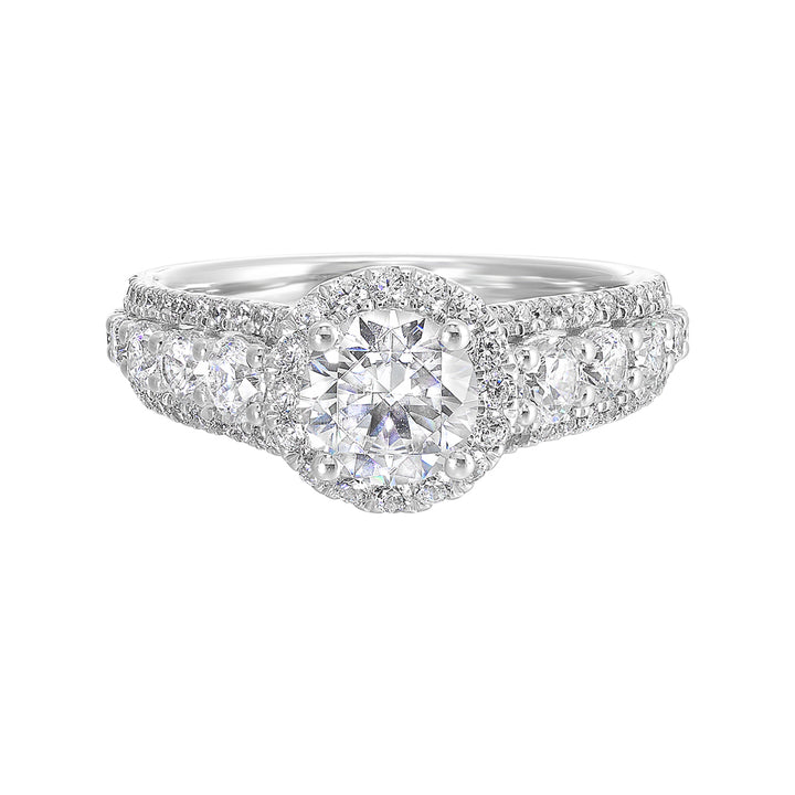 Large diamond set in center are sure to dazzle and delight the one you love with tapered three row look.