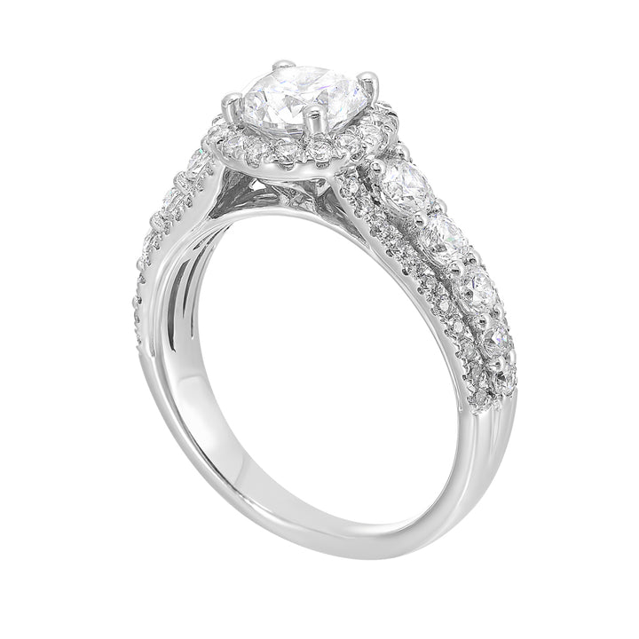 Large diamond set in center are sure to dazzle and delight the one you love with tapered three row look.