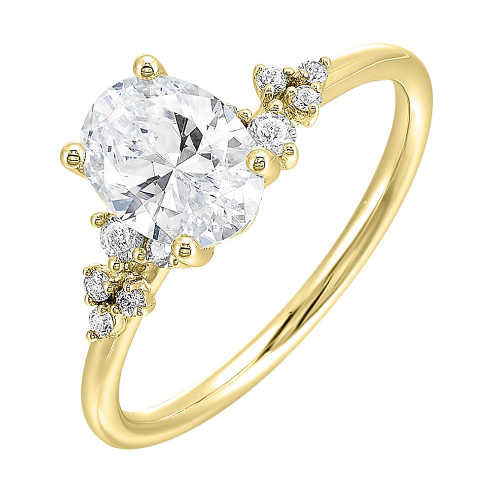 This simply gorgeous engagement ring with oval center features a sleek gold band with floating diamonds on either sides in random placement coming together beautifully.