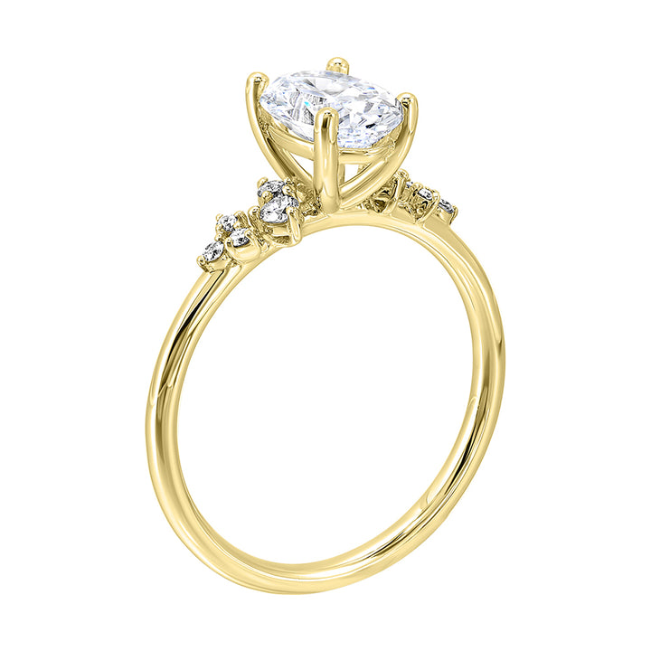 This simply gorgeous engagement ring with oval center features a sleek gold band with floating diamonds on either sides in random placement coming together beautifully.