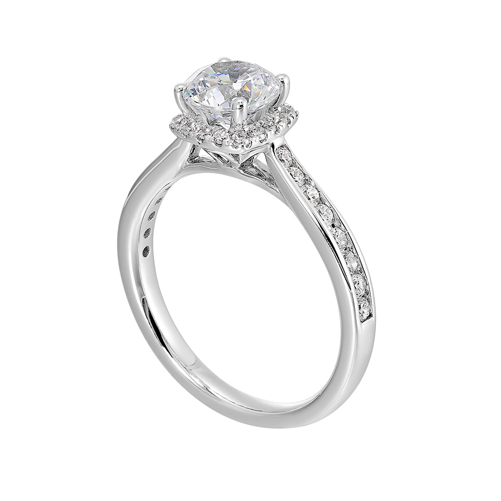Cushion diamond halo engagement ring with a channel set diamond band is the perfect representation of high end elegance.