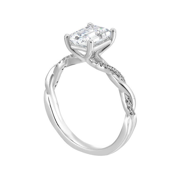This beautiful ring features a shimmering strand of pave diamonds entwined with a lustrous metal highlights the emerald center.