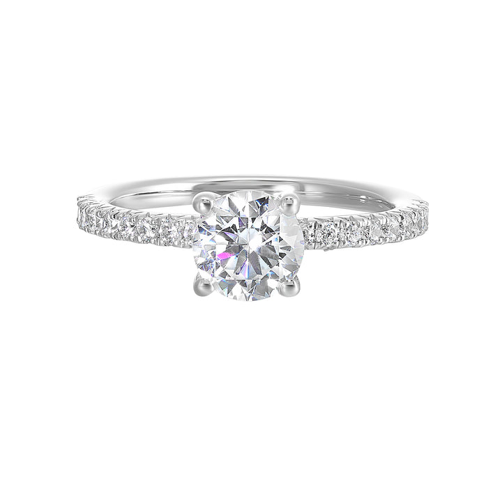 A timeless solitaire with tapered french setting highlights the center diamond adding extra dose of elegant sparkle.