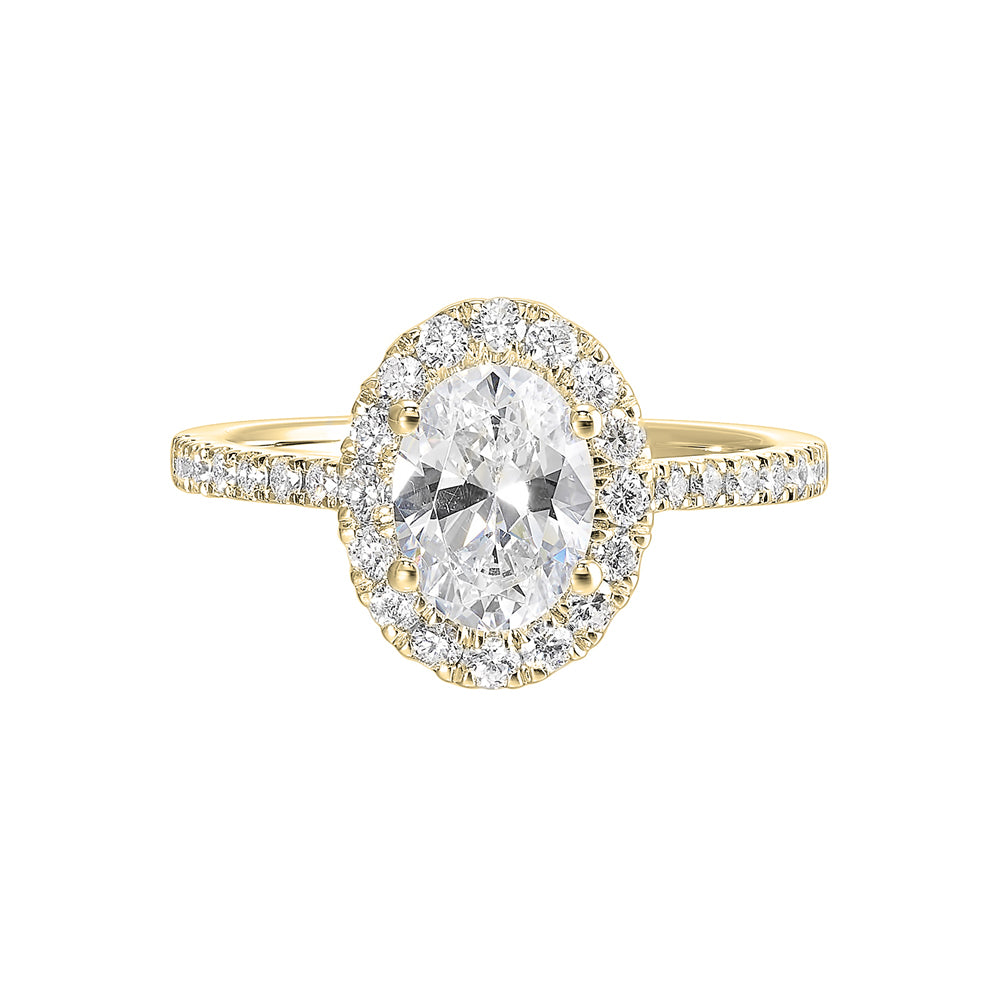 Oval solitaire halo ring with sleek diamond studded shank, this design offers a romantic look for your special moments.