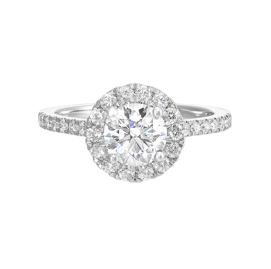 Dazzle with classic round solitaire framed by a sparkling halo. The studded shank adds a touch of classic look, making this ring a timeless symbol of elegance.