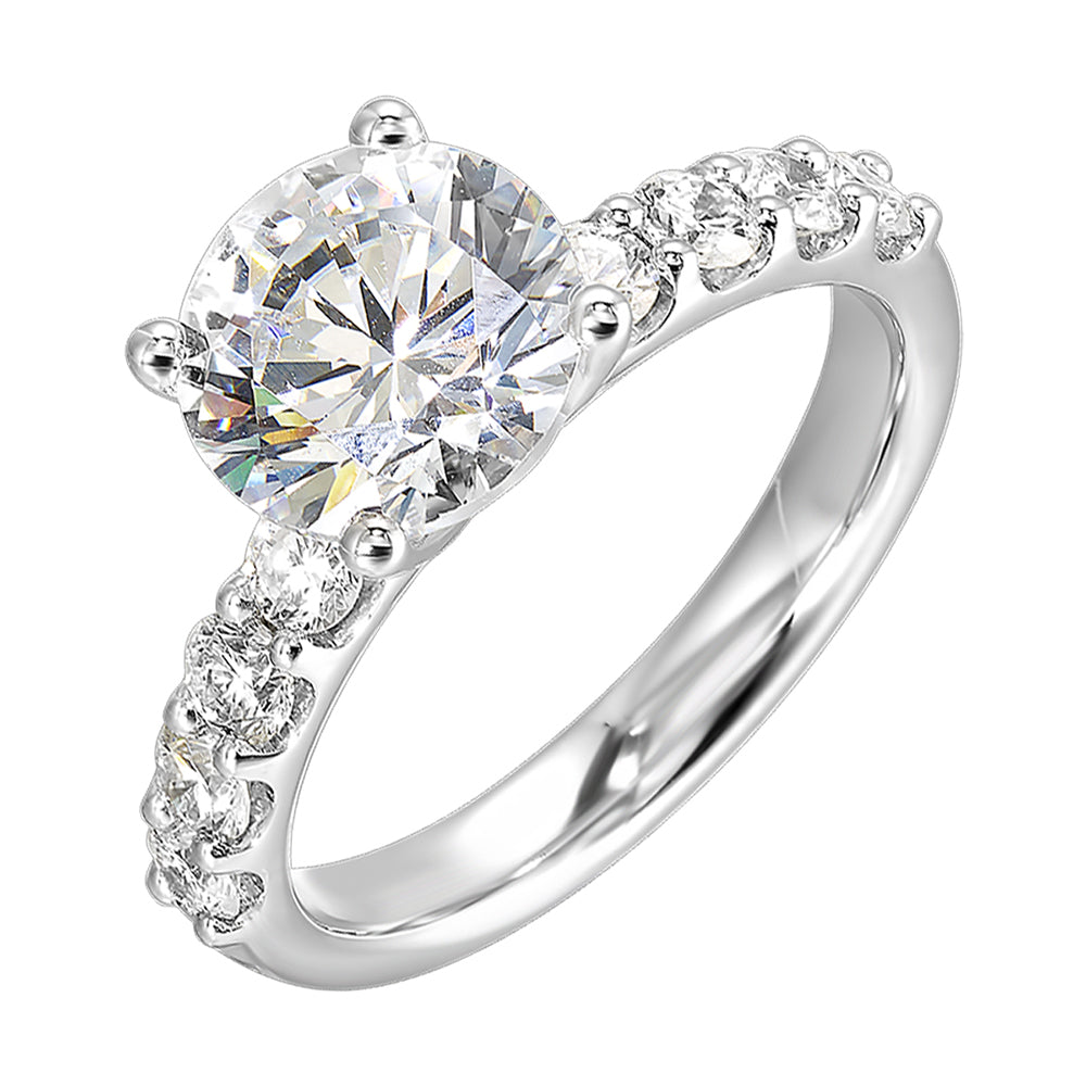 Bigger round diamonds rest on either side of this solitaire engagement ring, creating a modern yet timeless look.